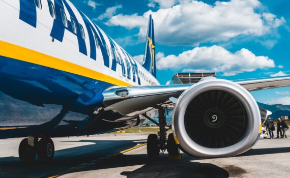 photo of blue and white passenger plane turbine